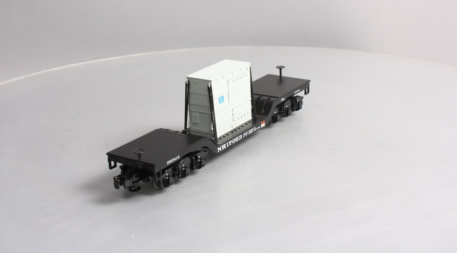 MTH 30-76511 O Gauge New Haven Depressed Center Flatcar w/Transformer Load
