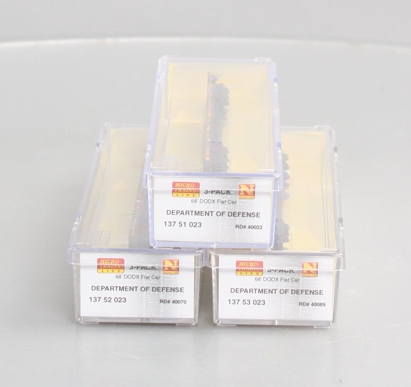 Micro-Trains 99305520 N DODX Weathered 68' Flatcar (Set of 3)