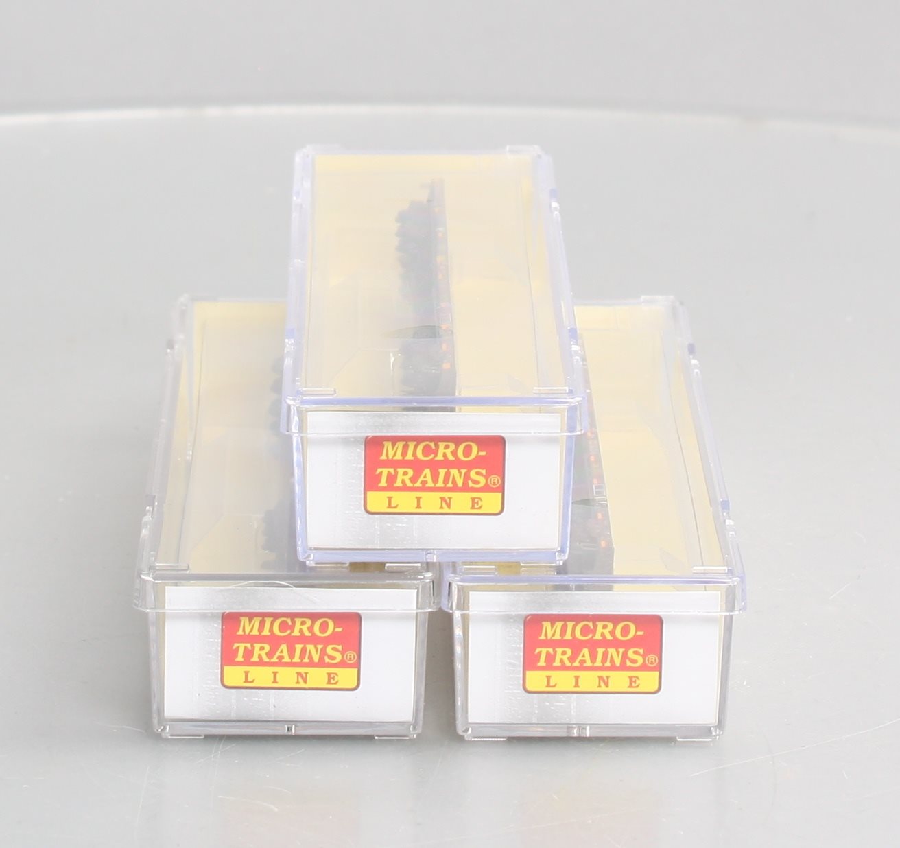 Micro-Trains 99305520 N DODX Weathered 68' Flatcar (Set of 3)