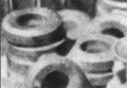 Micro Engineering 80-140 N White Metal Castings Stacked Tires (Pack of 7)