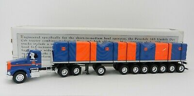 Spec Cast 33056 Hamilton Steel Peterbuilt 385 Day Cap w/ Tarp Load