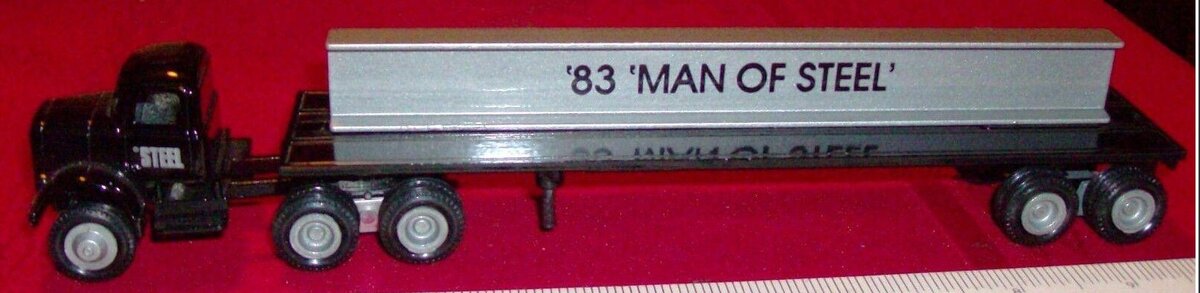 Winross 33-1 1:64 Die-Cast Heublein "1983 Man of Steel" Flatbed w/I Beam Truck