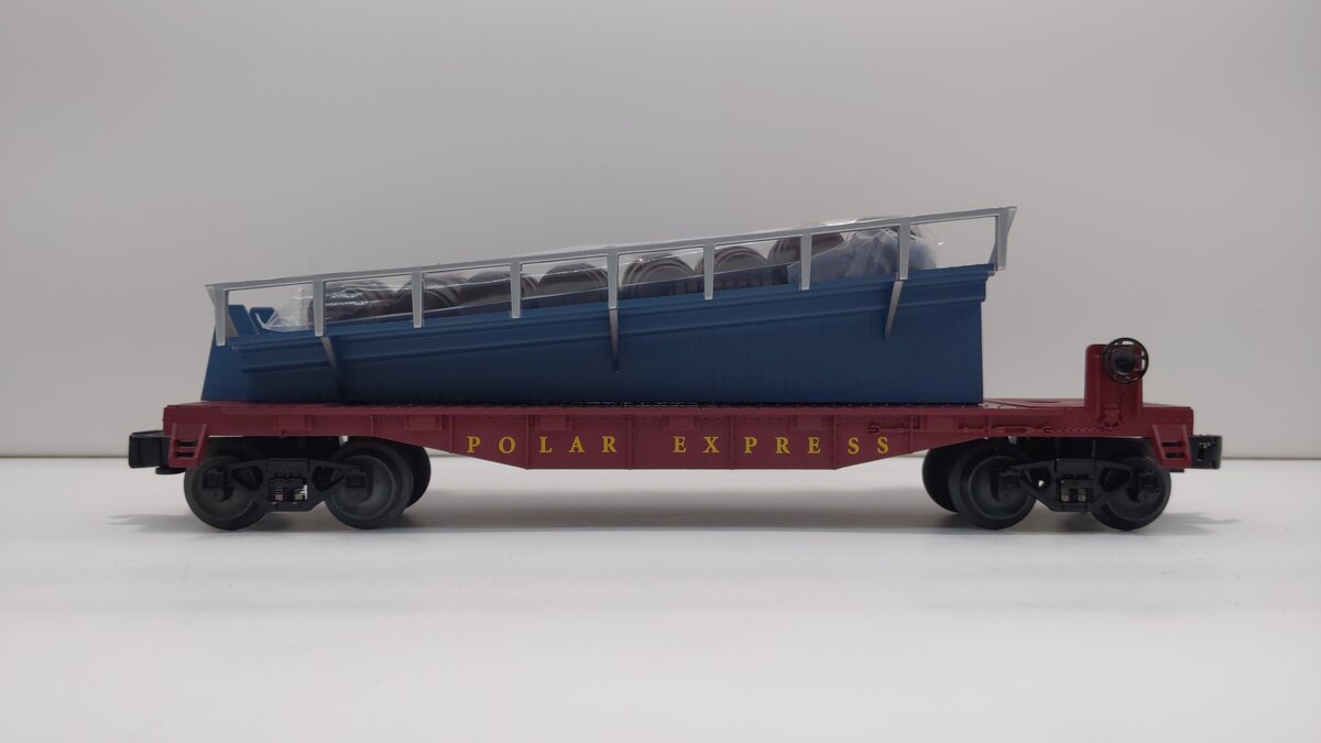 Lionel 1928430 O The Polar Express Barrel Ramp Car