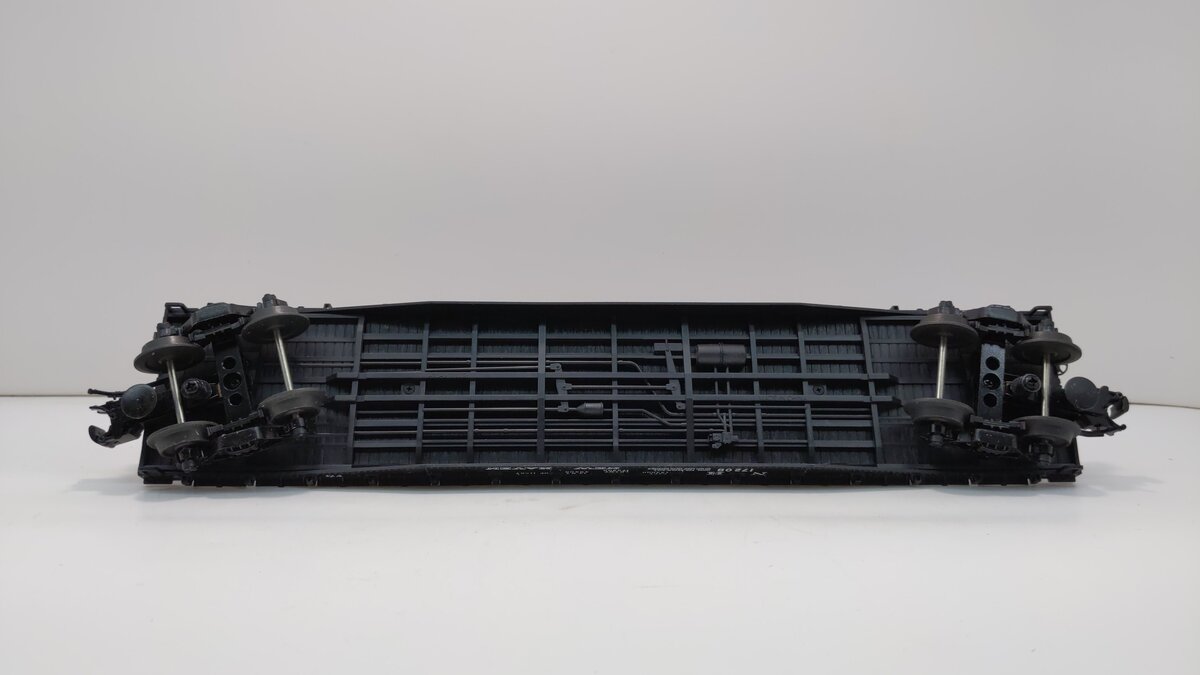 Atlas 933-1 O Gauge New Haven 52'6" Flatcar w/Pipe Load #17208 (3 Rail)
