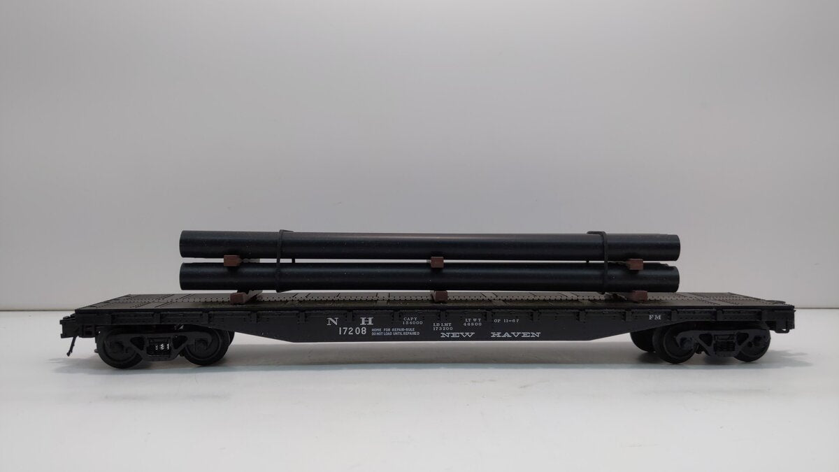 Atlas 933-1 O Gauge New Haven 52'6" Flatcar w/Pipe Load #17208 (3 Rail)