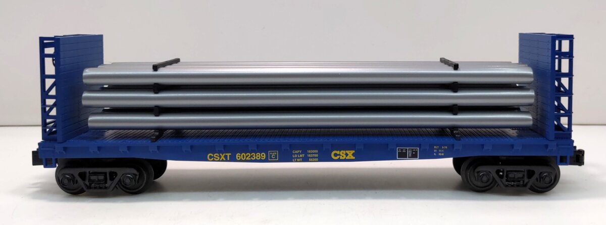 MTH 30-76453 O CSX Flat Car with Bulkheads & Pipe Load