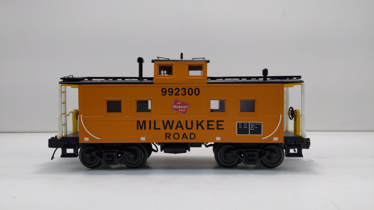 MTH 20-91717 O Milwaukee Road Center Cupola Steel Caboose #992300