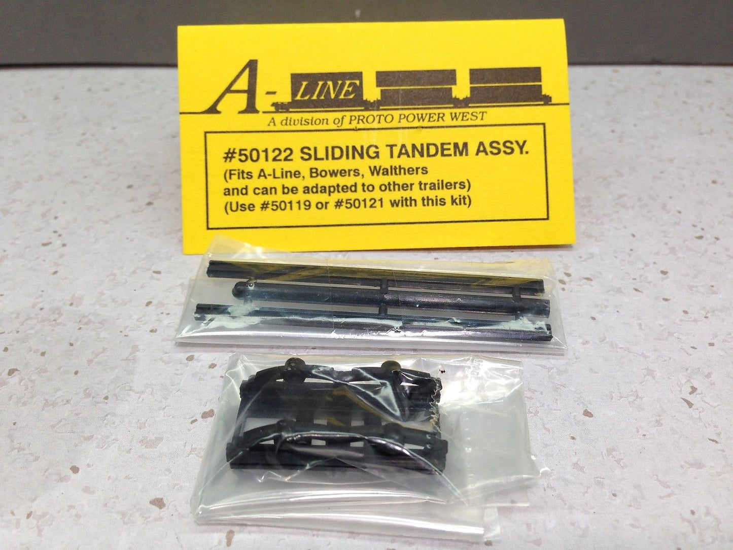A-Line 50122 HO Sliding Tandem Assembly - (Leaf Spring) Pkg 1